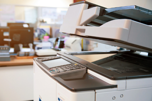 Close up of an office printer to demonstrate the importance of Managed Print Services